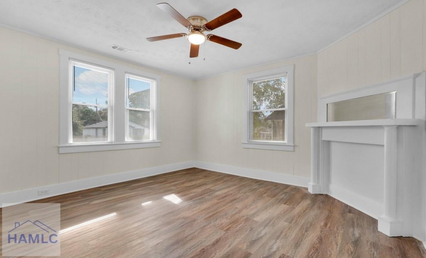 Spacious Living Room with decorative fireplace